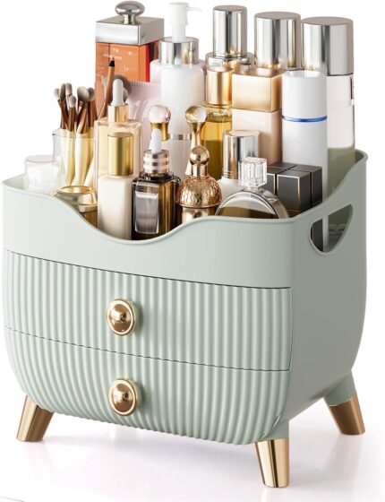 Green YGJT makeup organizer with two drawers and a top compartment, featuring a golden handle and filled with various cosmeti